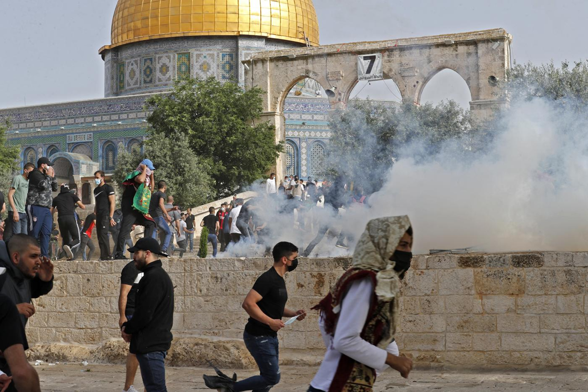 Israeli police storm Al-Aqsa Mosque compound, fire tear gas